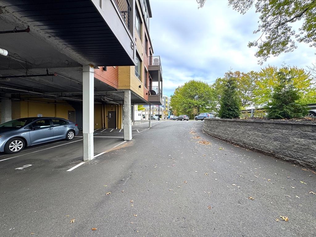 302 Broadway, Unit 303 Everett, MA 02149 - Photo 11 of 11 a view of a car garage