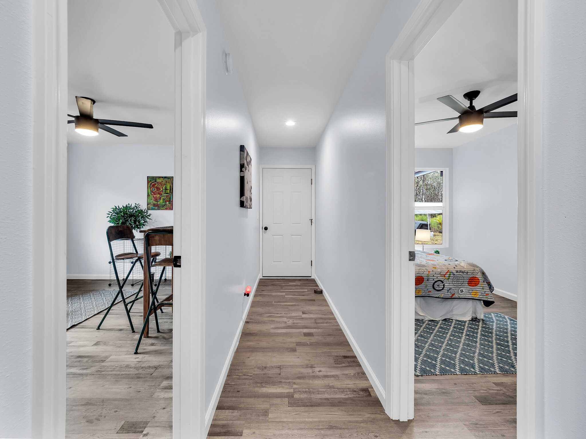 11-2789 Hibiscus Street Mountain View, HI 96771 - Photo 12 of 30 a view of hallway with livingroom and furniture