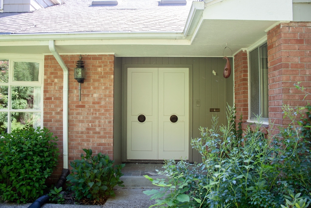 13 Montclair Drive Worcester, MA 01609 - Photo 2 of 38 a view of front door and potted plants