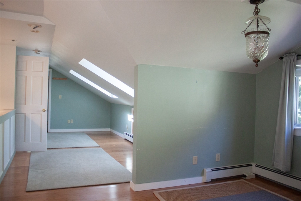 13 Montclair Drive Worcester, MA 01609 - Photo 27 of 38 a view of a room with wooden floor and stairs