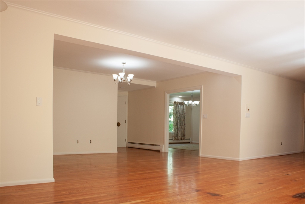 13 Montclair Drive Worcester, MA 01609 - Photo 9 of 38 a view of a hallway with wooden floor
