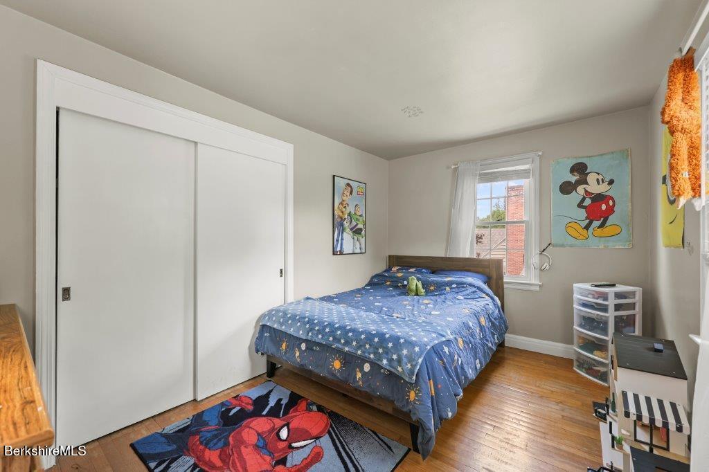 33 Eleanor Road Pittsfield, MA 01201 - Photo 35 of 45 a bedroom with a bed dresser and a window