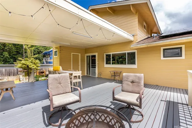 a view of a chair in wooden deck