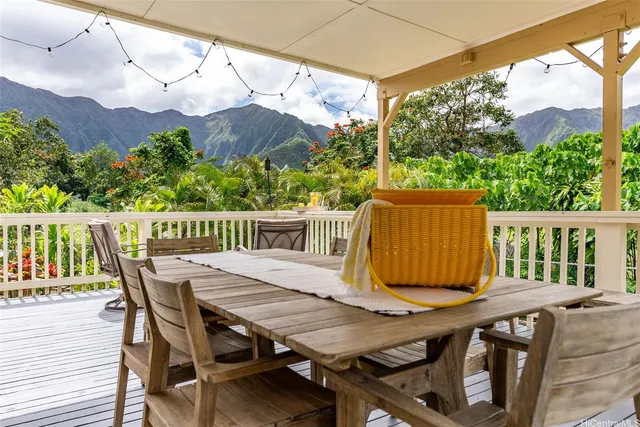 a view of house with yard and entertaining space