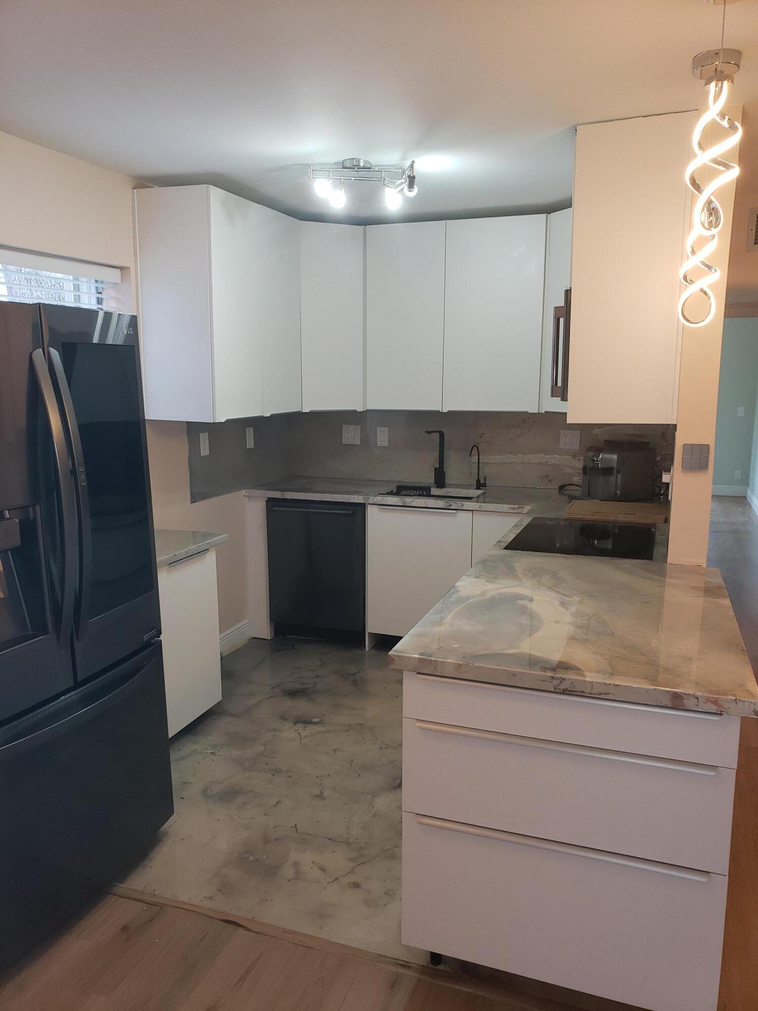 923 Normandy Trail Delray Beach, FL 33484 - Photo 4 of 11 20230120_134643