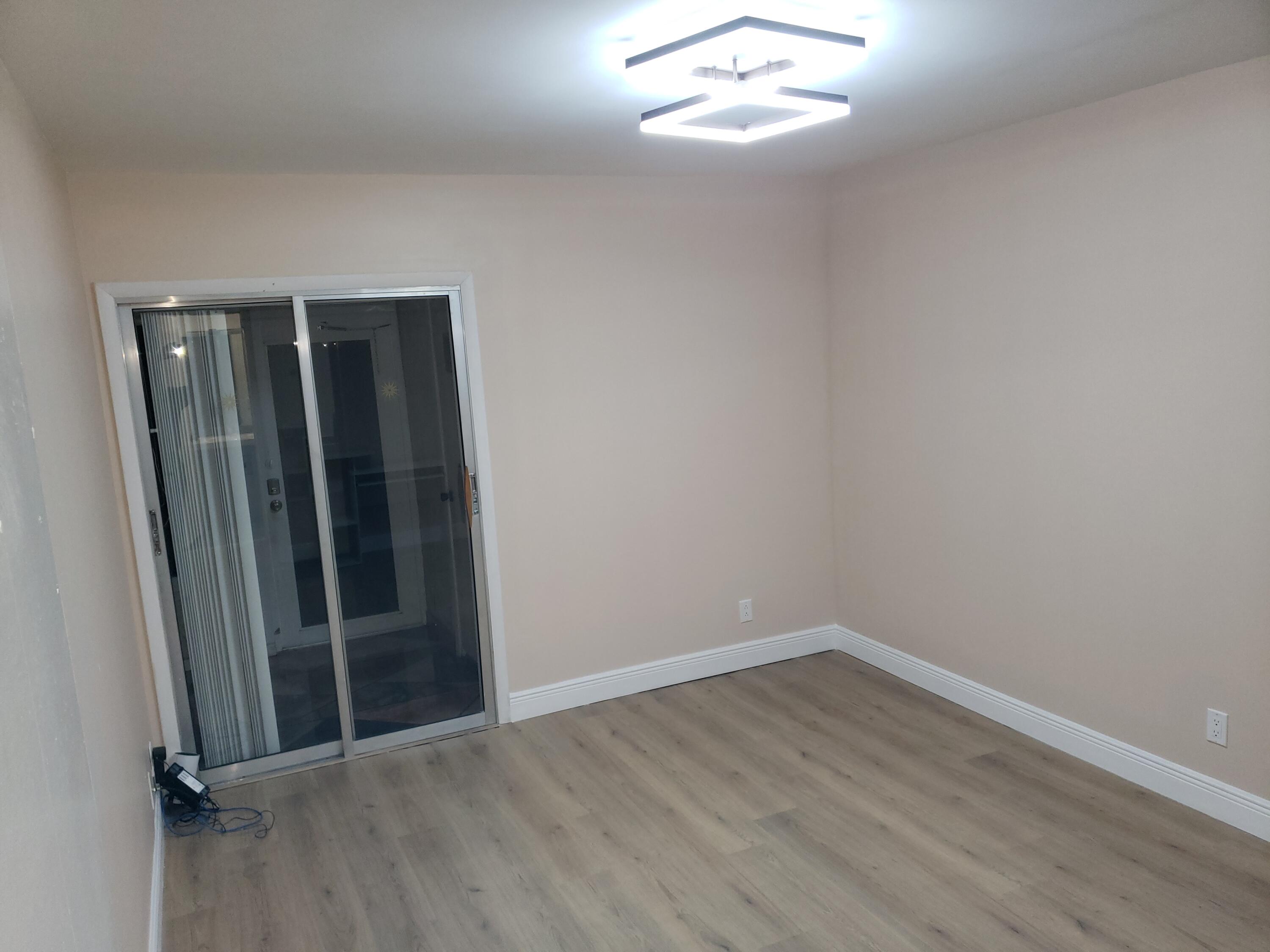 923 Normandy Trail Delray Beach, FL 33484 - Photo 6 of 11 20230118_190112