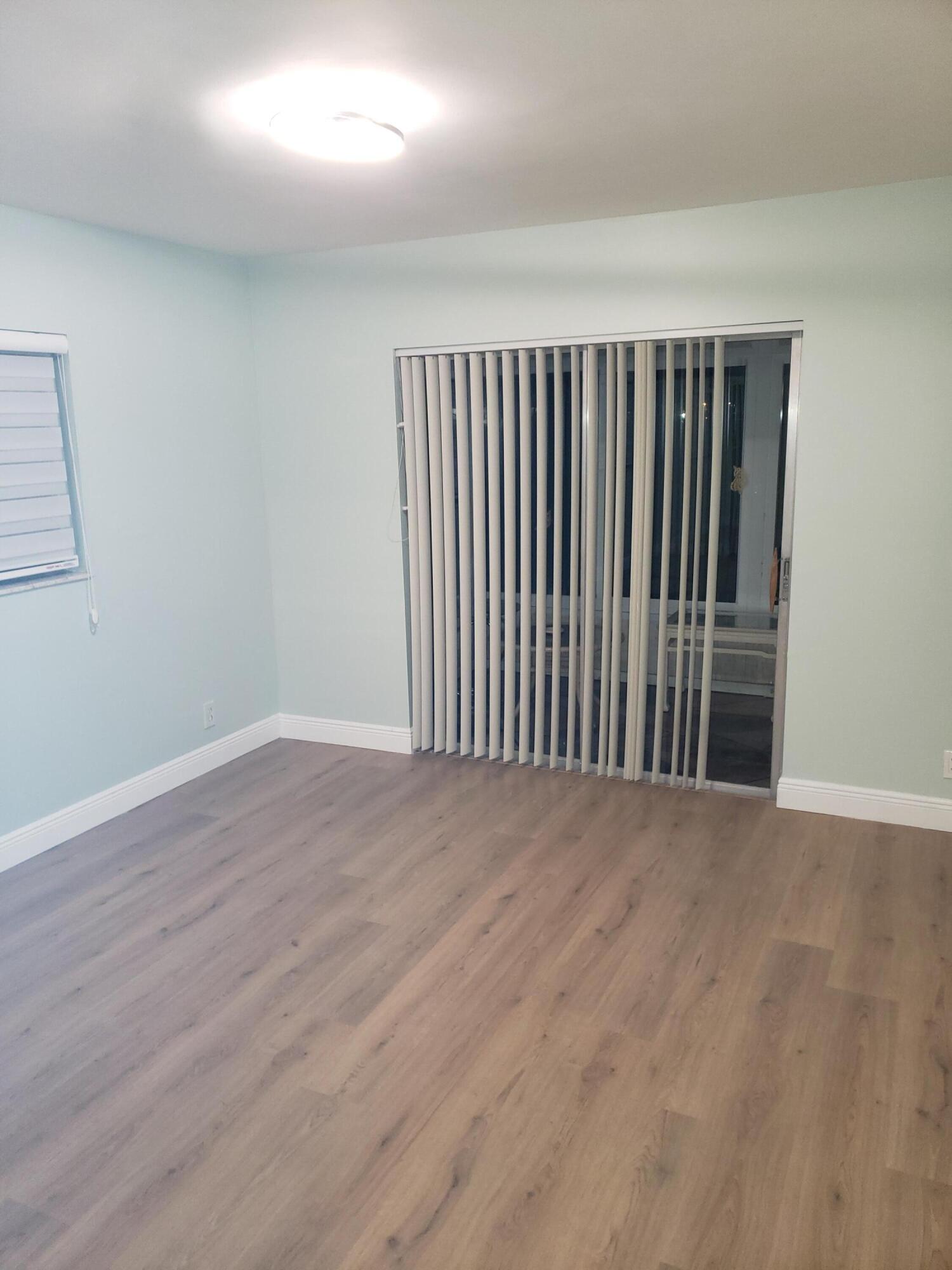 923 Normandy Trail Delray Beach, FL 33484 - Photo 9 of 11 20230118_190105