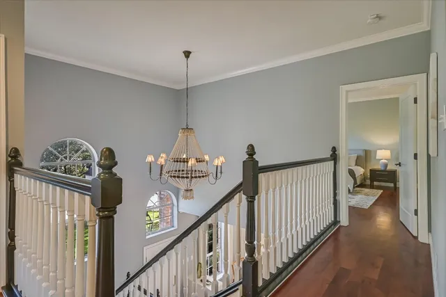 a view of a hallway view with staircase