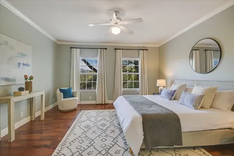 a spacious bedroom with a large bed and a window