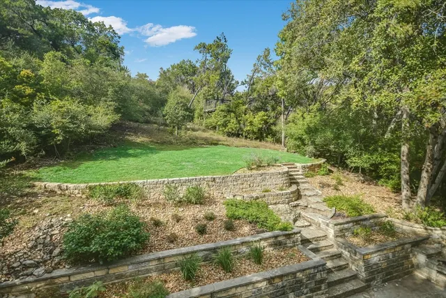 a view of a field with an trees