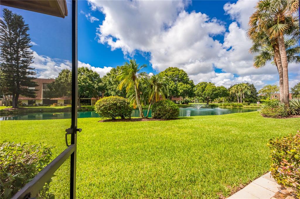 3100 Southeast Pruitt Road, Unit B102 Port St. Lucie, FL 34952 - Photo 27 of 33 a view of a garden