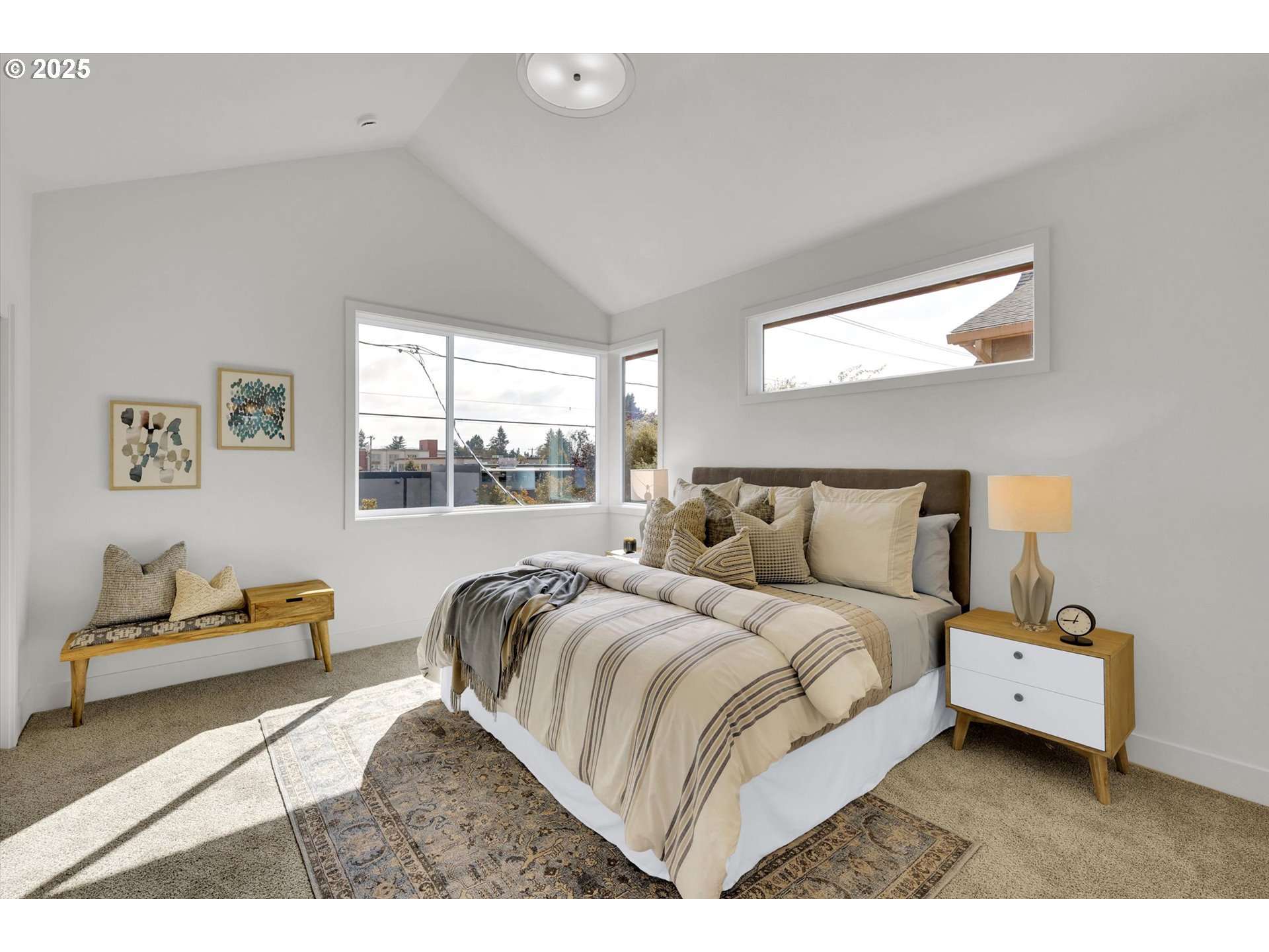 5773 South Kelly Avenue Portland, OR 97239 - Photo 20 of 33 a bedroom with a bed and a window