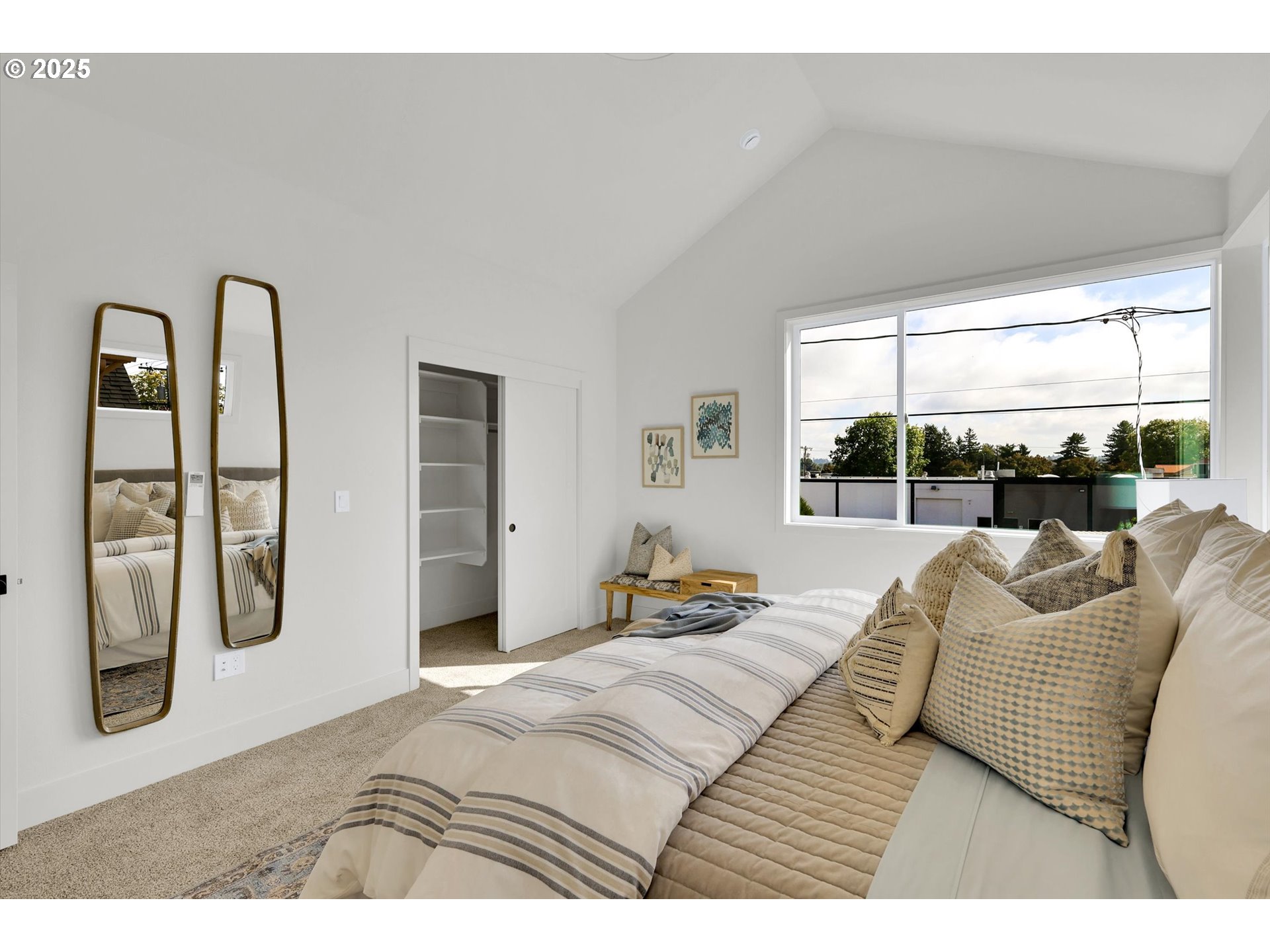 5773 South Kelly Avenue Portland, OR 97239 - Photo 22 of 33 a bedroom with furniture and a large window