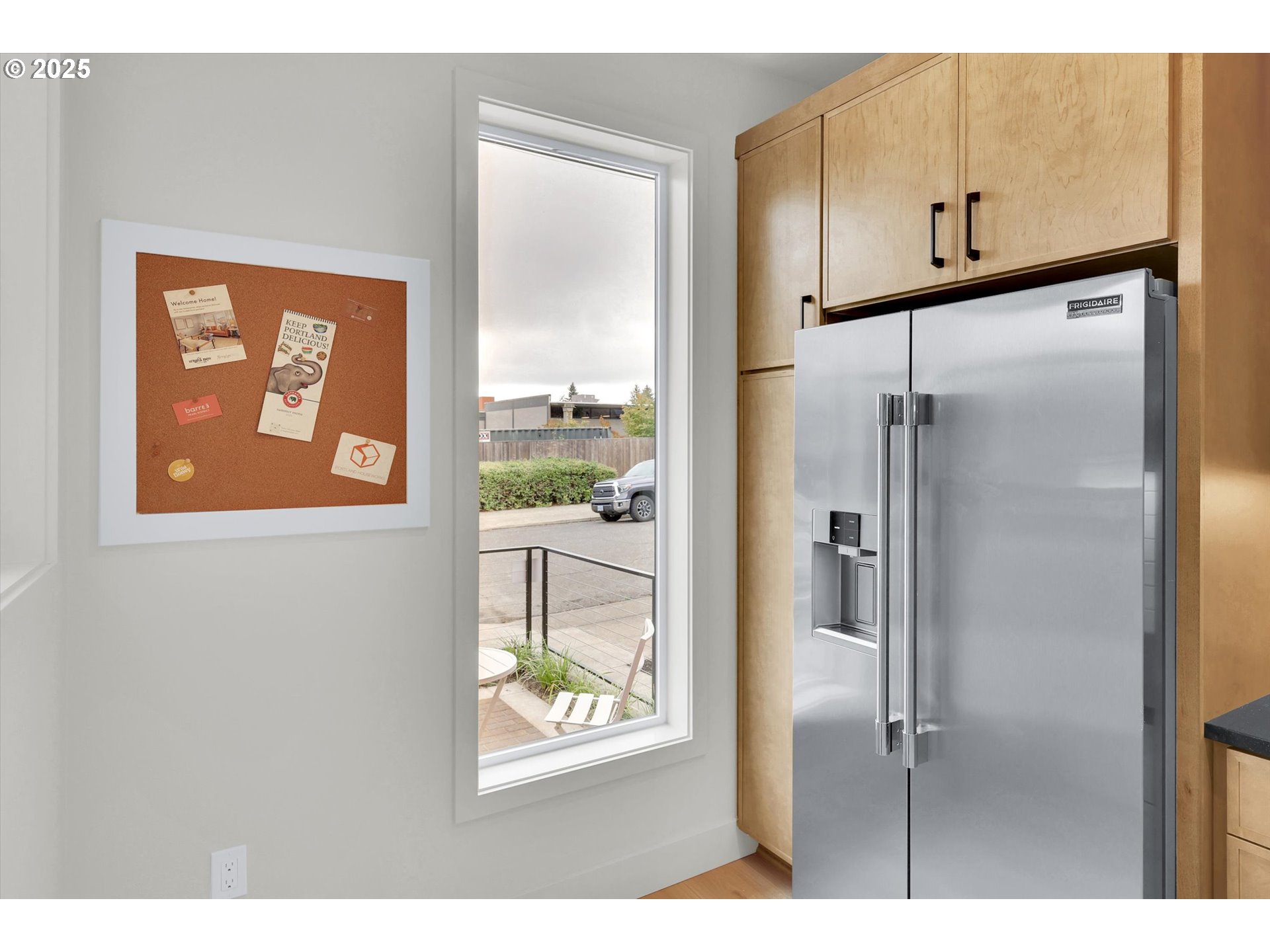 5773 South Kelly Avenue Portland, OR 97239 - Photo 8 of 33 a picture of a bathroom with a glass shower door