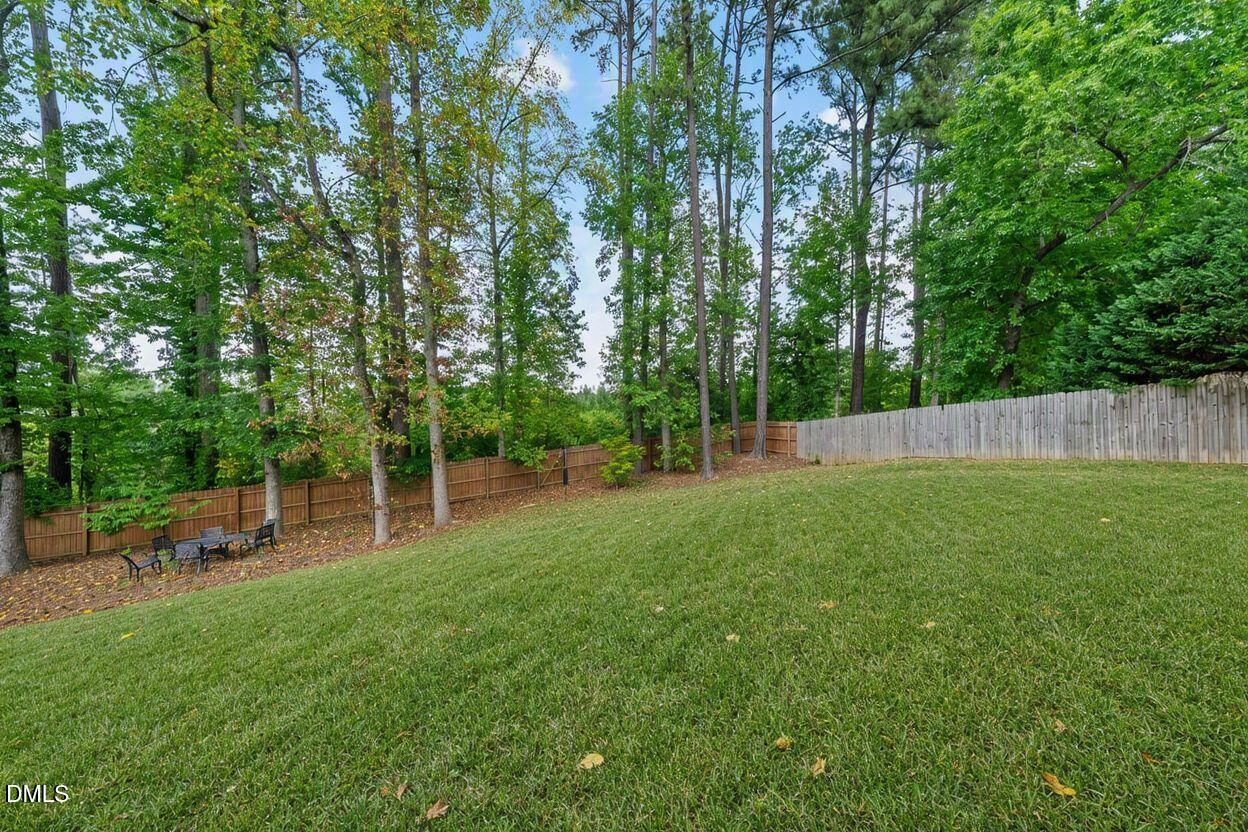 140 Restonwood Drive Apex, NC 27539 - Photo 53 of 63 Backyard enhanced