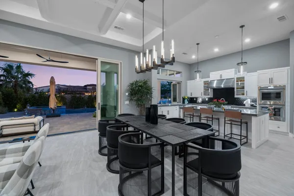 a view of living room with furniture and a flat screen tv
