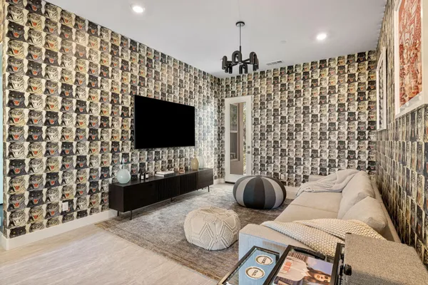 a living room with furniture and a table