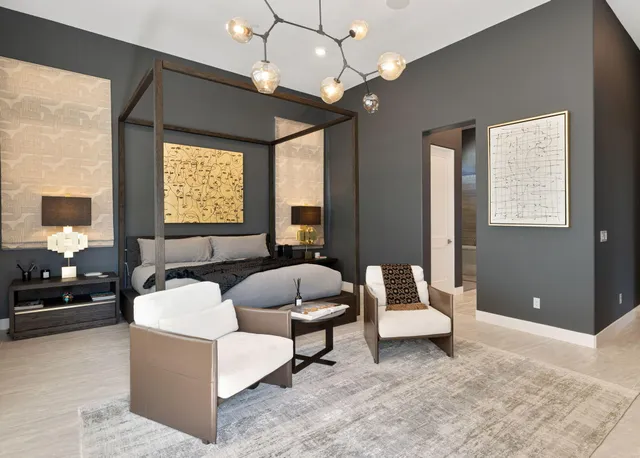 a bedroom with a bed window and walk in closet