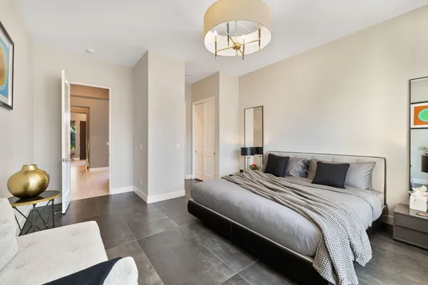 a living room with fireplace furniture and a flat screen tv