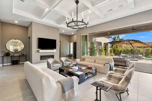 a kitchen with a table chairs stove and cabinets