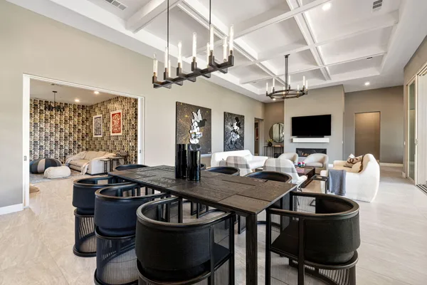 a room with a large window and wooden floor