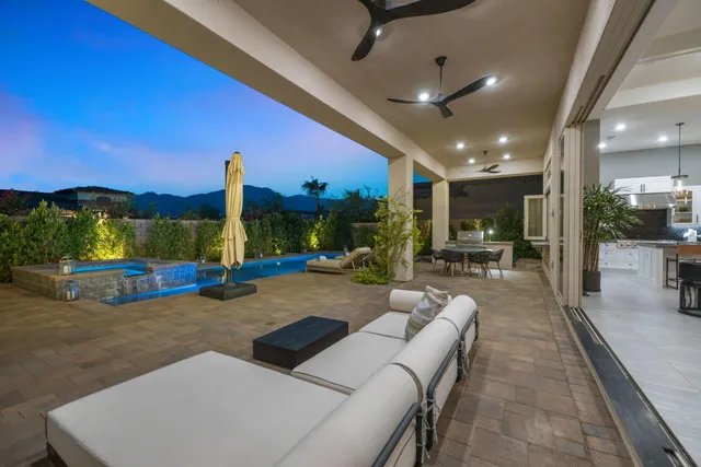 a view of a house with porch and sitting area