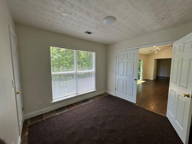 1512 Upper Sassafras Road Jasper, GA 30143 - Photo 32 of 41 an empty room with a empty space and a window