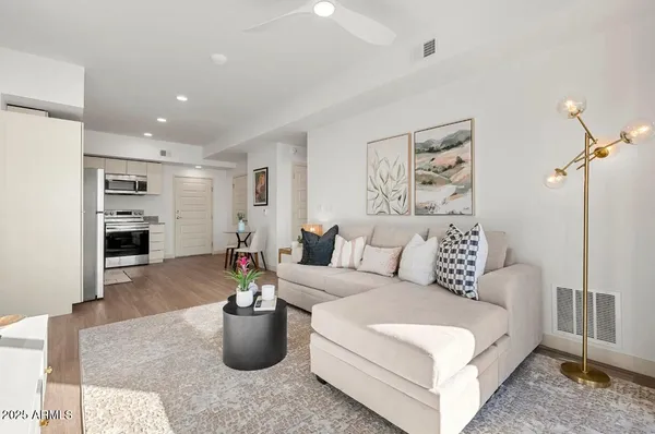 a living room with furniture and a couch