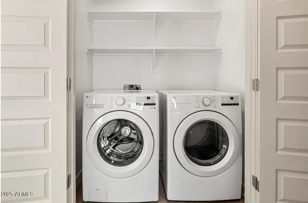 a utility room with dryer and washer