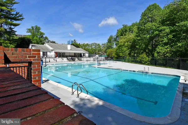 a view of a building with traffic signal lights