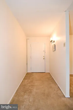 a view of a small space with wooden floor
