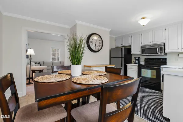 a view of a dining room with furniture