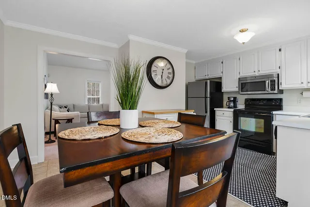 a view of a dining room with furniture