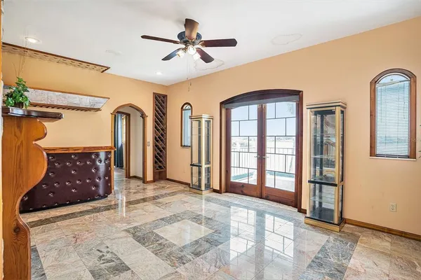 a view of a hallway with entryway dining room and livingroom view