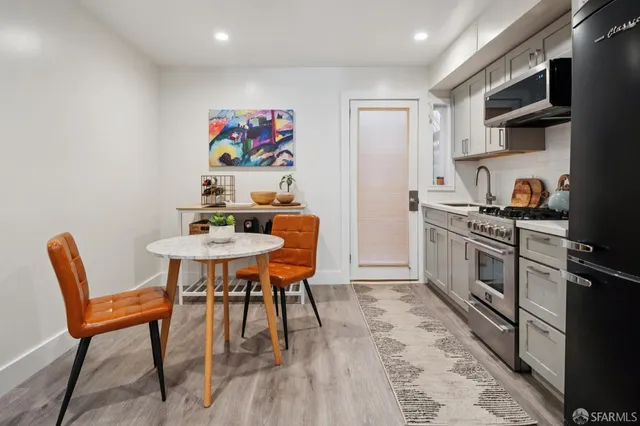 a view of a dining room with furniture