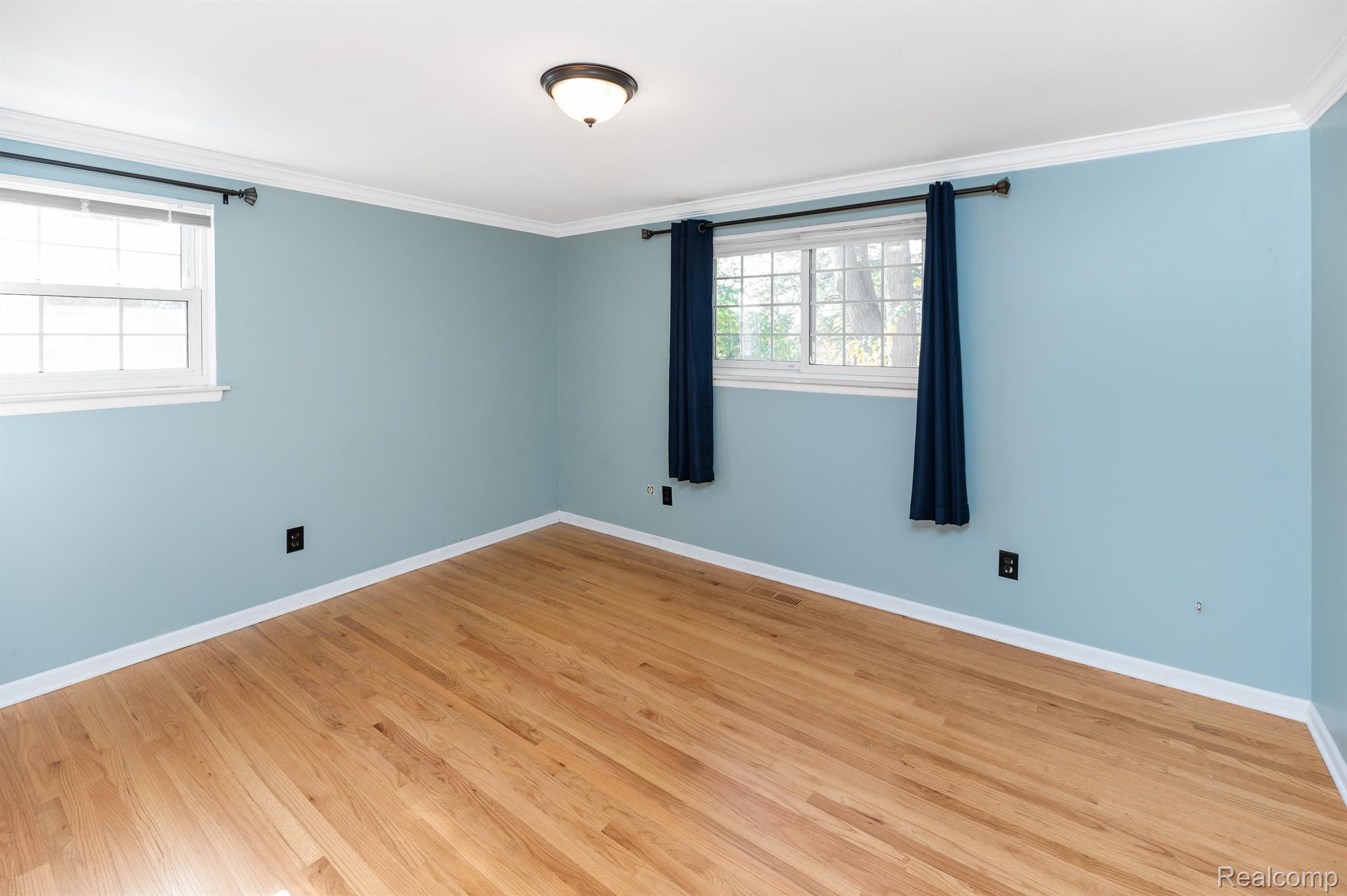 373 Bellarmine Drive Rochester, MI 48309 - Photo 6 of 15 Primary Bedroom with Hardwood Floors