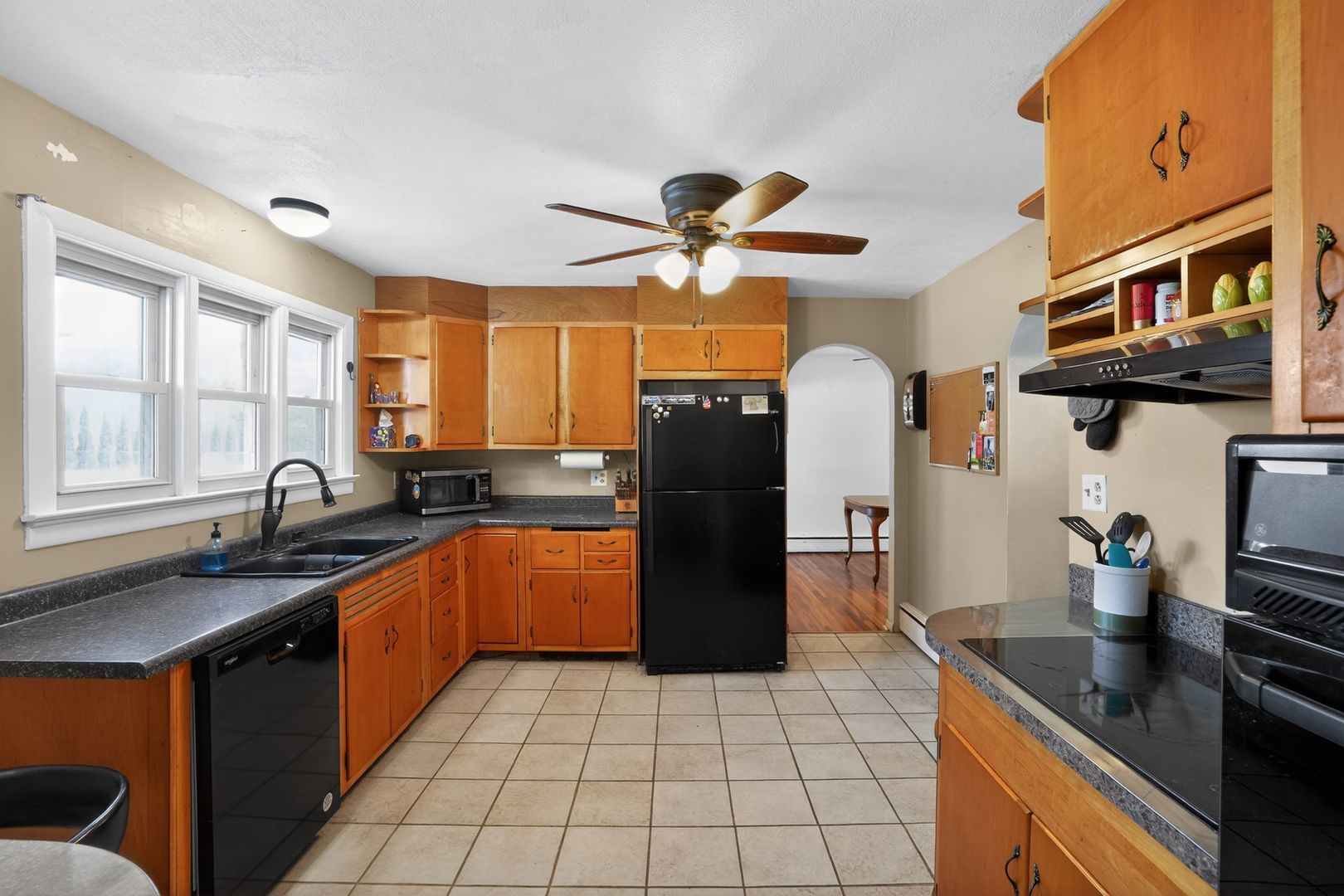 2388 McFarland Road Rockford, IL 61108 - Photo 17 of 33 a kitchen with stainless steel appliances granite countertop a sink stove and refrigerator