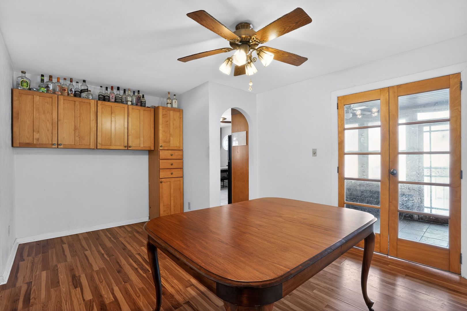 2388 McFarland Road Rockford, IL 61108 - Photo 21 of 33 a view of a kitchen with a table and a refrigerator