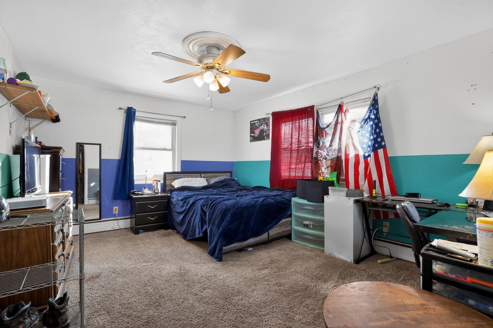 2388 McFarland Road Rockford, IL 61108 - Photo 23 of 33 a living room with furniture and a flat screen tv