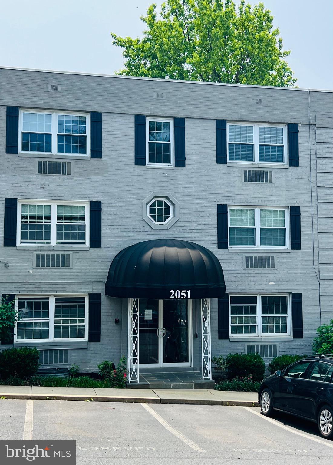 2051 North Woodstock Street, Unit 102 Arlington, VA 22207 - Photo 1 of 1 a front view of a building