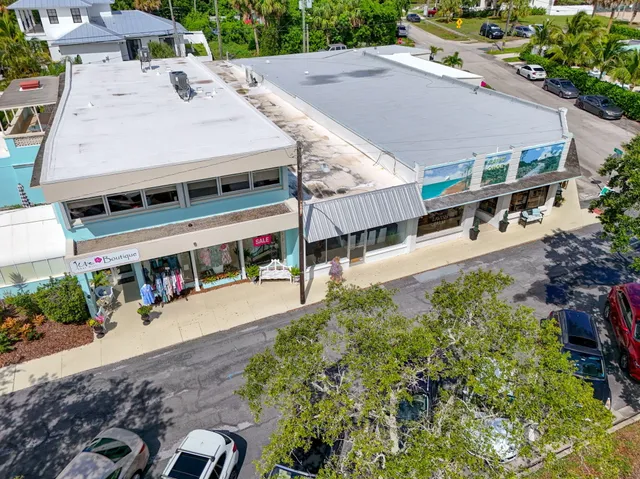 an aerial view of a city with lake