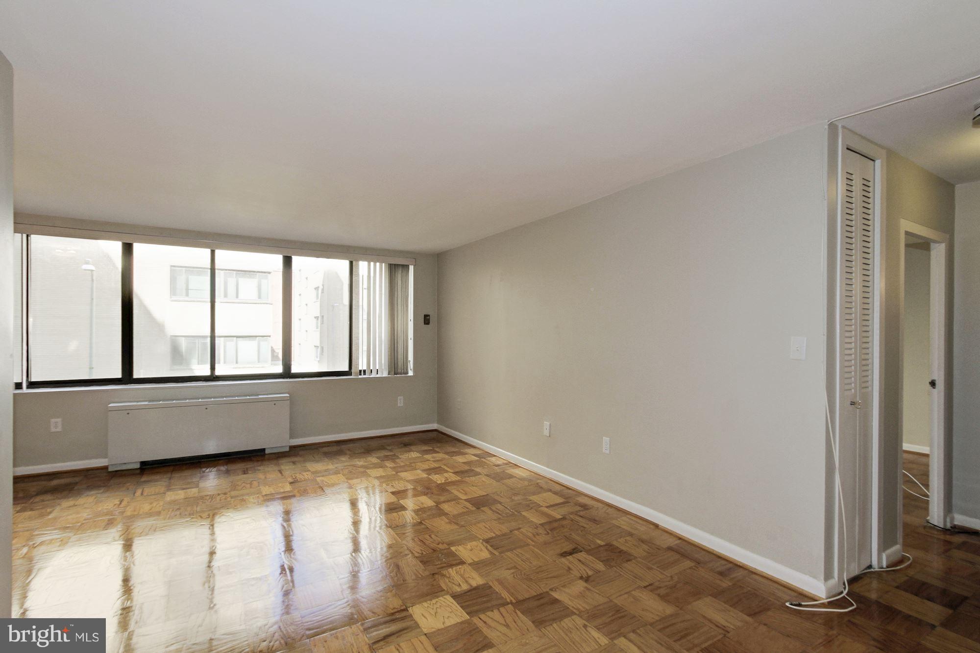 522 21st Street Northwest, Unit 301 Washington, DC 20006 - Photo 2 of 29 a view of an empty room and window