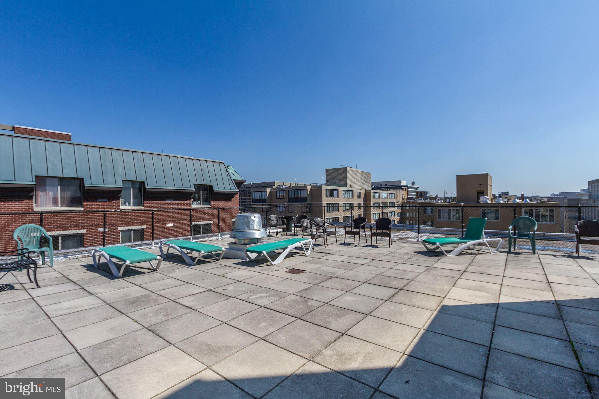 522 21st Street Northwest, Unit 301 Washington, DC 20006 - Photo 19 of 29 a patio with water view and city view