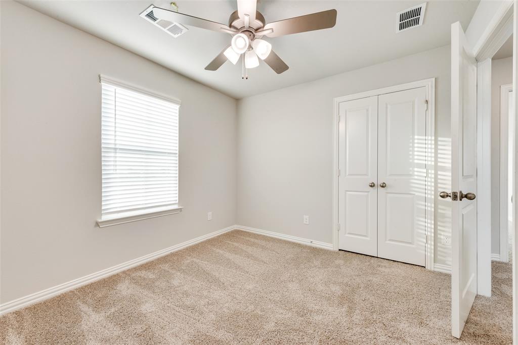 280 Sutter Mill Road Saginaw, TX 76131 - Photo 13 of 21 a view of an empty room with a window