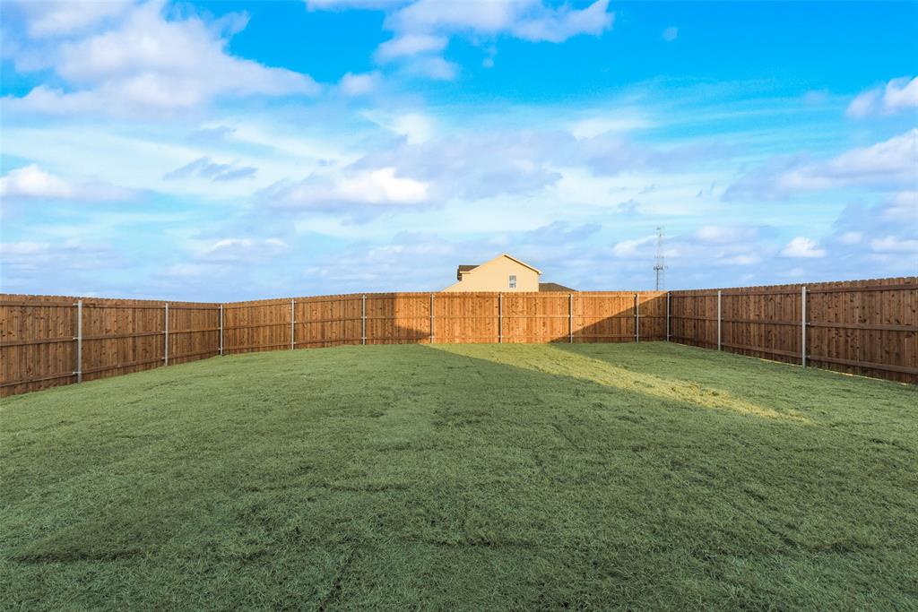 280 Sutter Mill Road Saginaw, TX 76131 - Photo 20 of 21 a view of a backyard