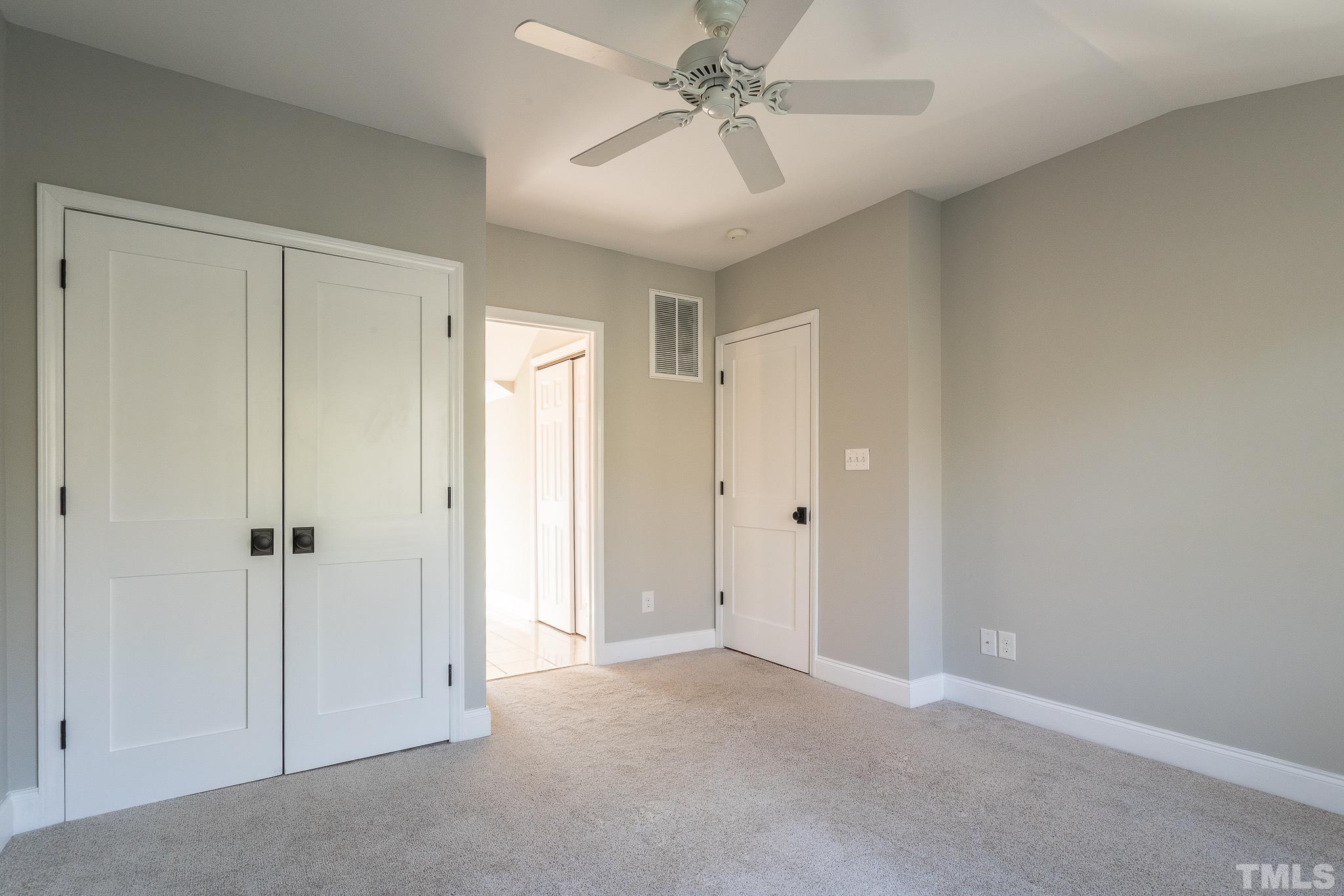 2725 Anderson Drive Raleigh, NC 27608 - Photo 17 of 27 a view of a livingroom with a chandelier fan