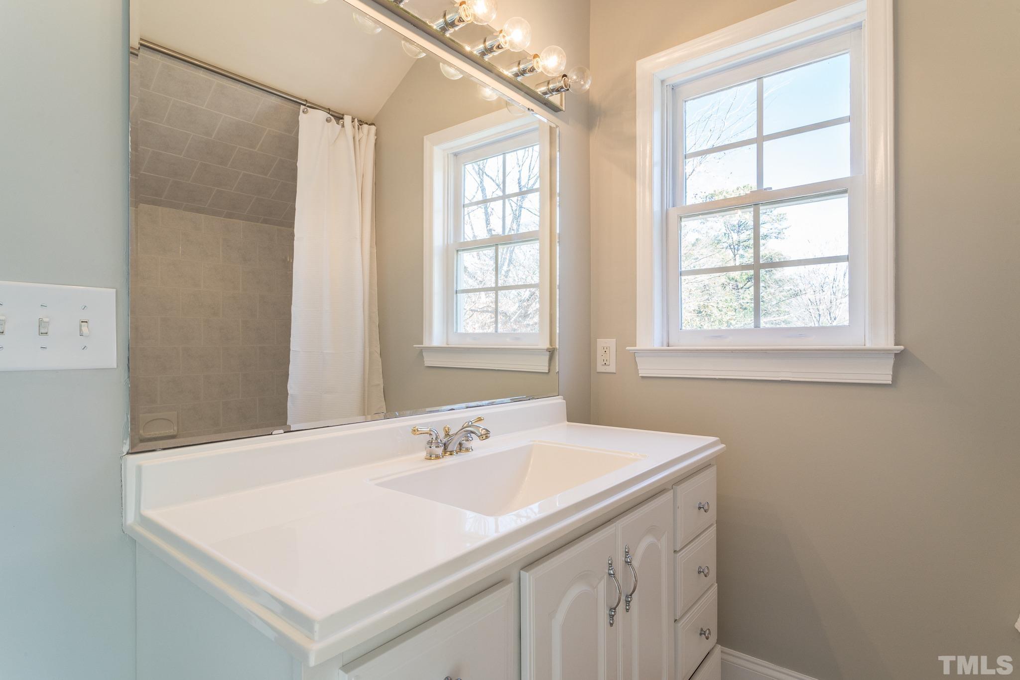 2725 Anderson Drive Raleigh, NC 27608 - Photo 19 of 27 a utility room with a window