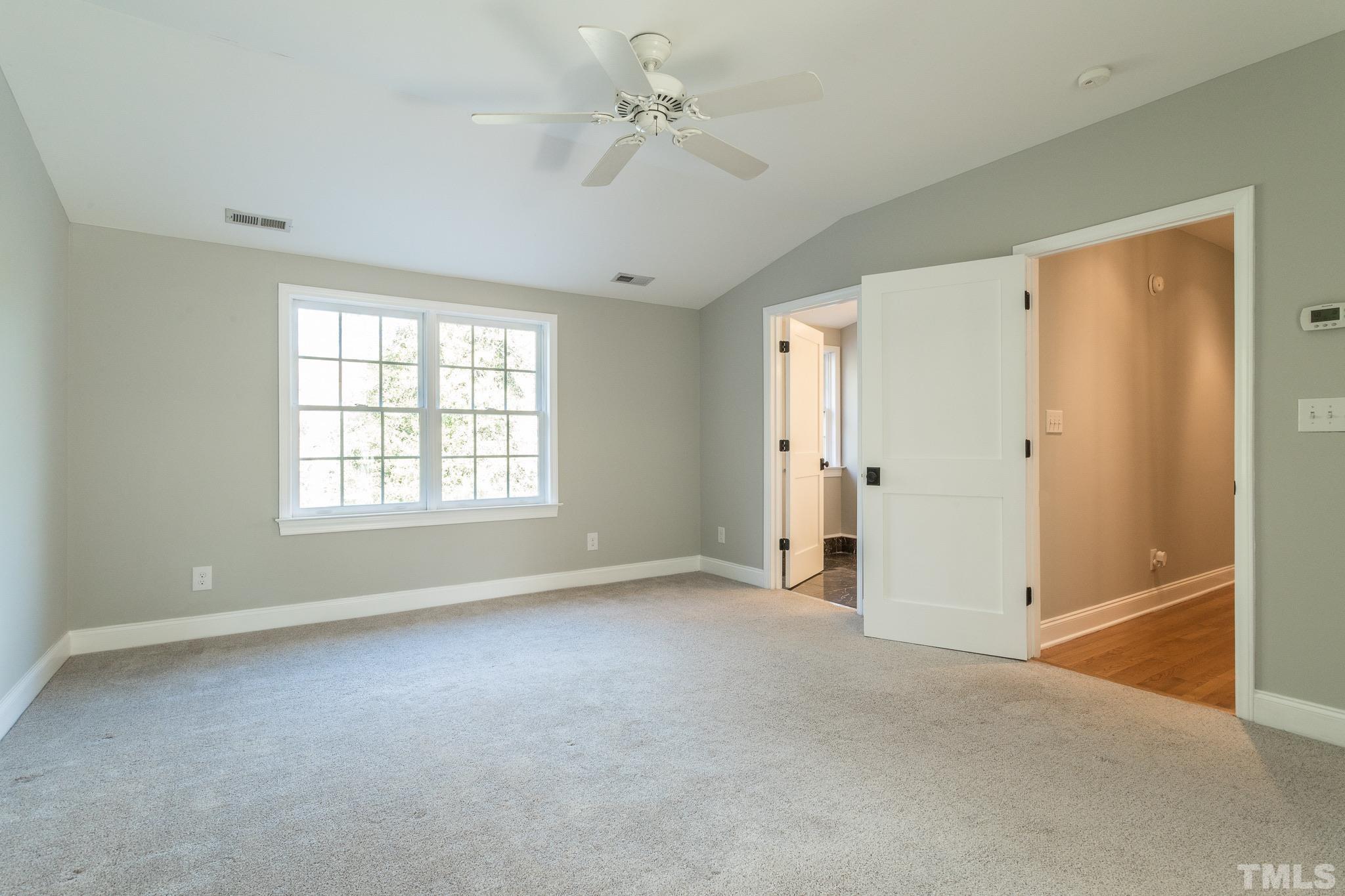2725 Anderson Drive Raleigh, NC 27608 - Photo 20 of 27 a view of an empty room with a window