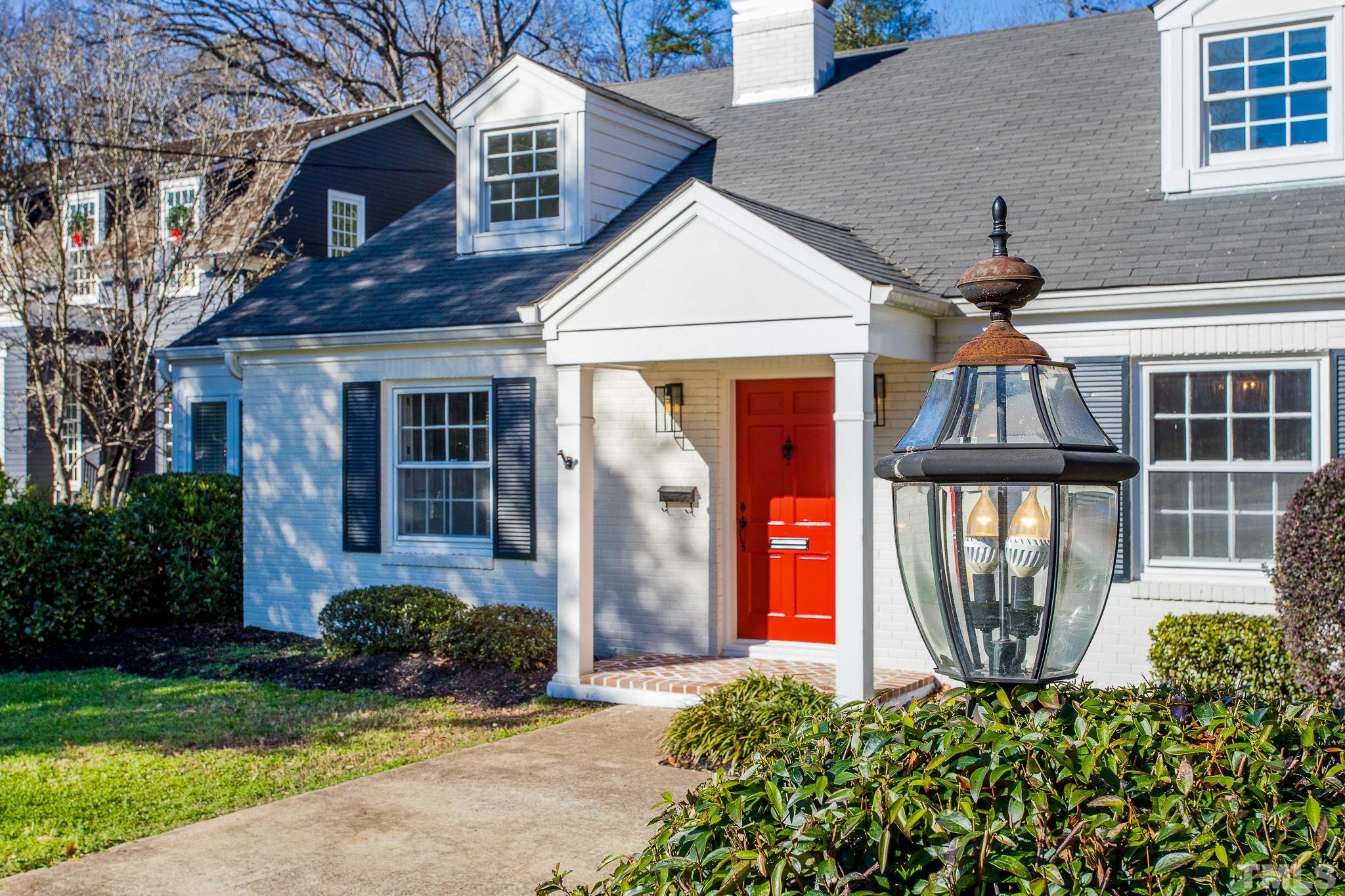 2725 Anderson Drive Raleigh, NC 27608 - Photo 3 of 27 a front view of a house with garden