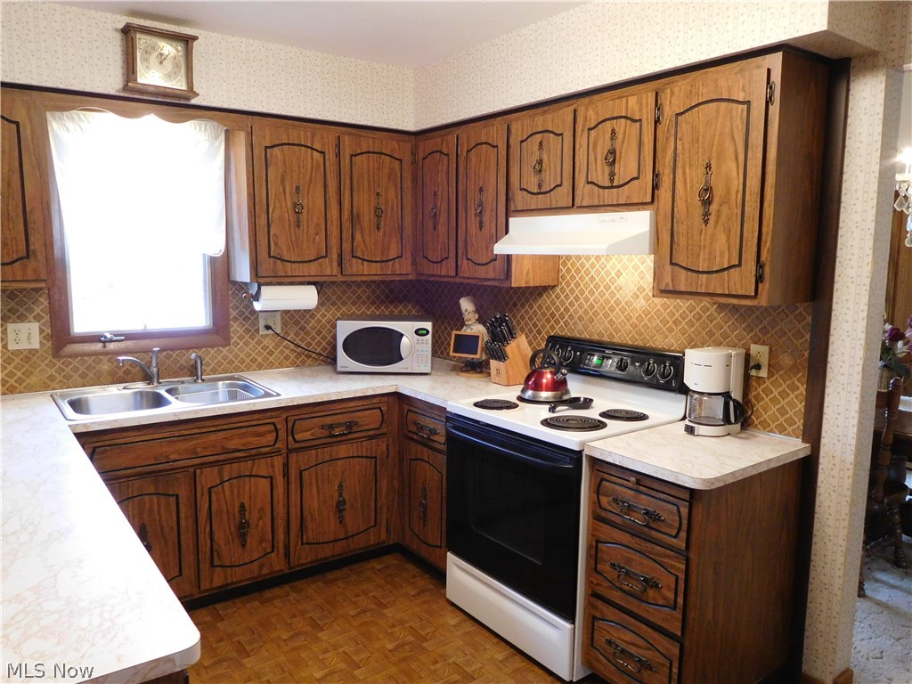 8721 Webster Road Strongsville, OH 44136 - Photo 3 of 13 Kitchen with newer sink, disposal and faucet!